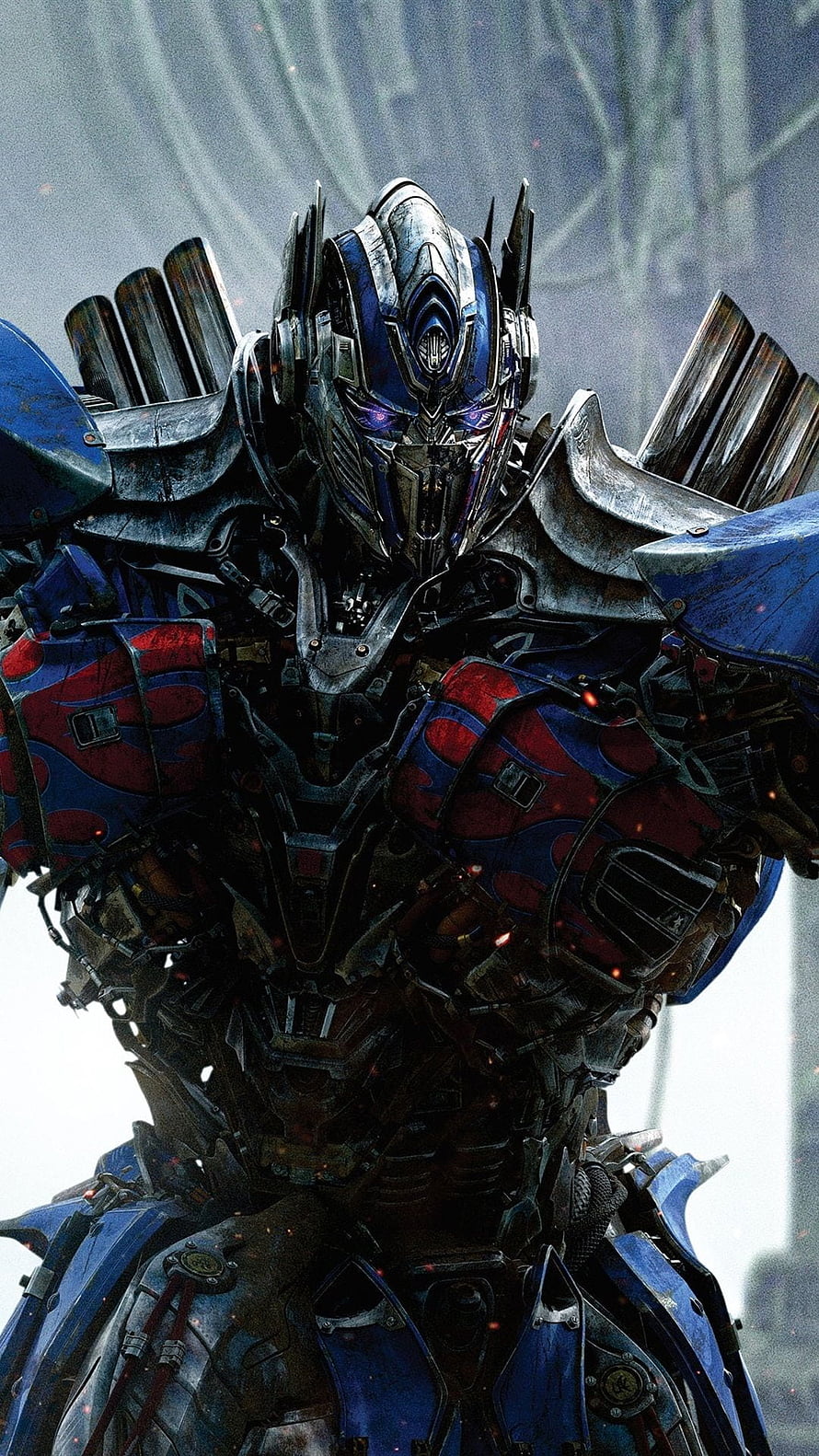 Optimus Prime from Transformers The Last Knight in battle-worn blue and red armor HD phone wallpaper