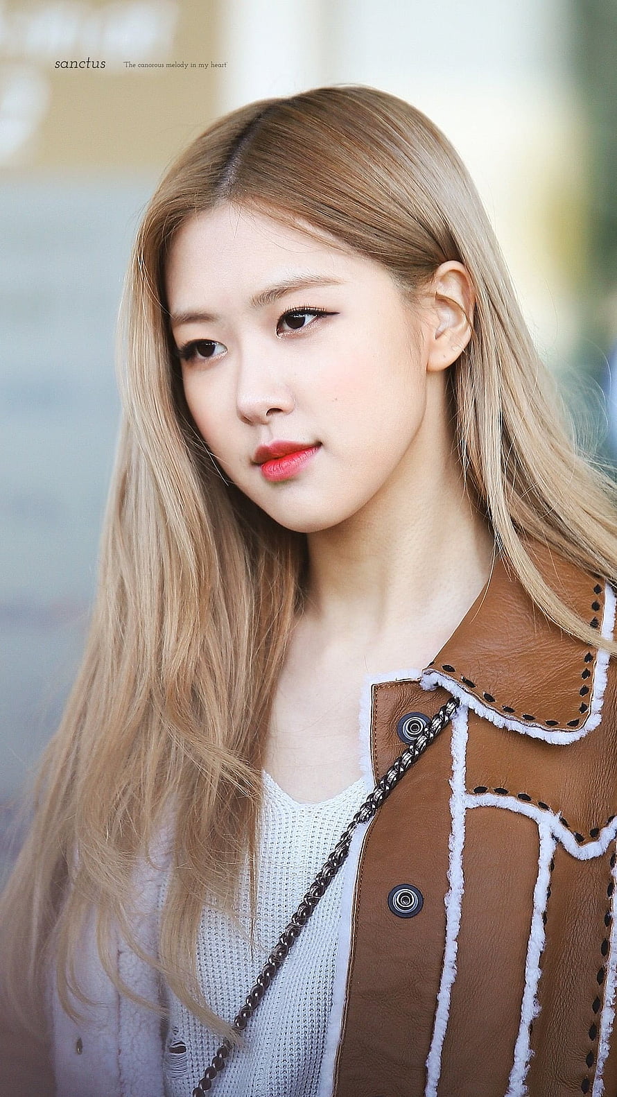 Rose from Blackpink in a brown leather jacket with long blonde hair HD phone wallpaper