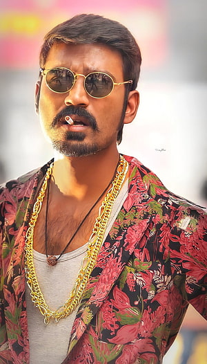 Dhanush in a floral blazer with gold chains and sunglasses HD phone wallpaper