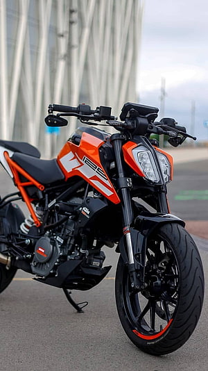 KTM 125 Duke Naked Motorcycle in Orange and Black HD phone wallpaper