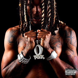 Waka Flocka Flame holding a large diamond pendant with tattoos and dreadlocks HD phone wallpaper