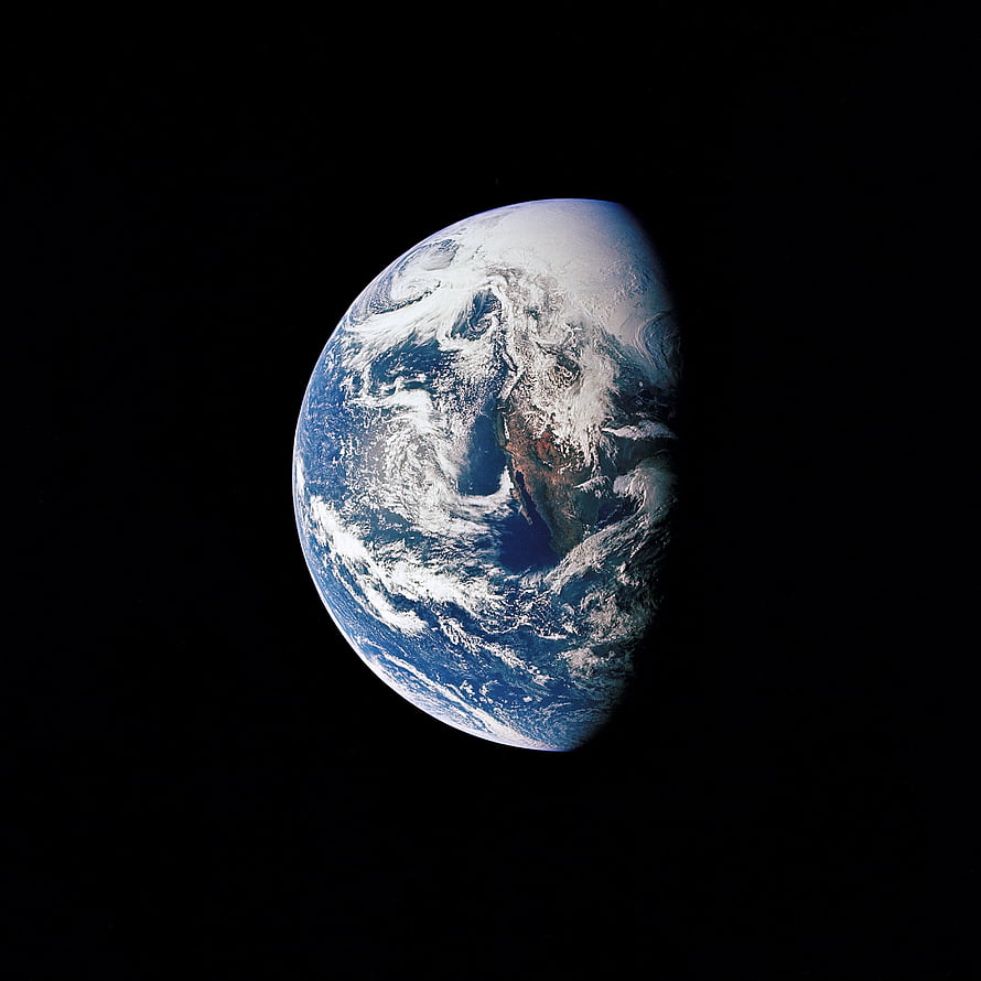 Earth From Space: Blue Planet With Swirling Clouds Against Black Void HD phone wallpaper