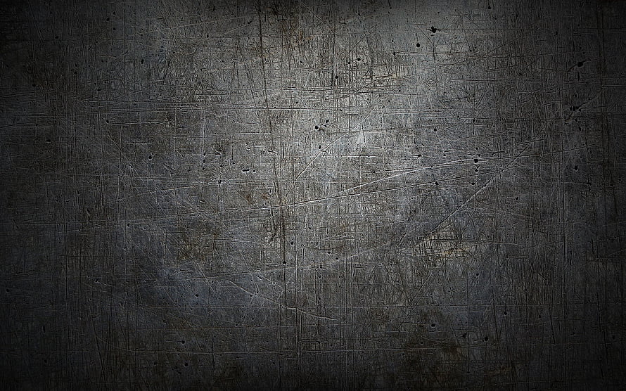 Dark scratched metal surface with industrial grunge texture and dramatic lighting HD wallpaper