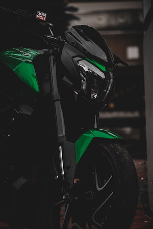 Kawasaki Z900 motorcycle front view with green and black fairing HD phone wallpaper