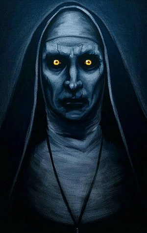 The Nun from The Conjuring Franchise with Glowing Yellow Eyes in Dark Hooded Portrait HD phone wallpaper