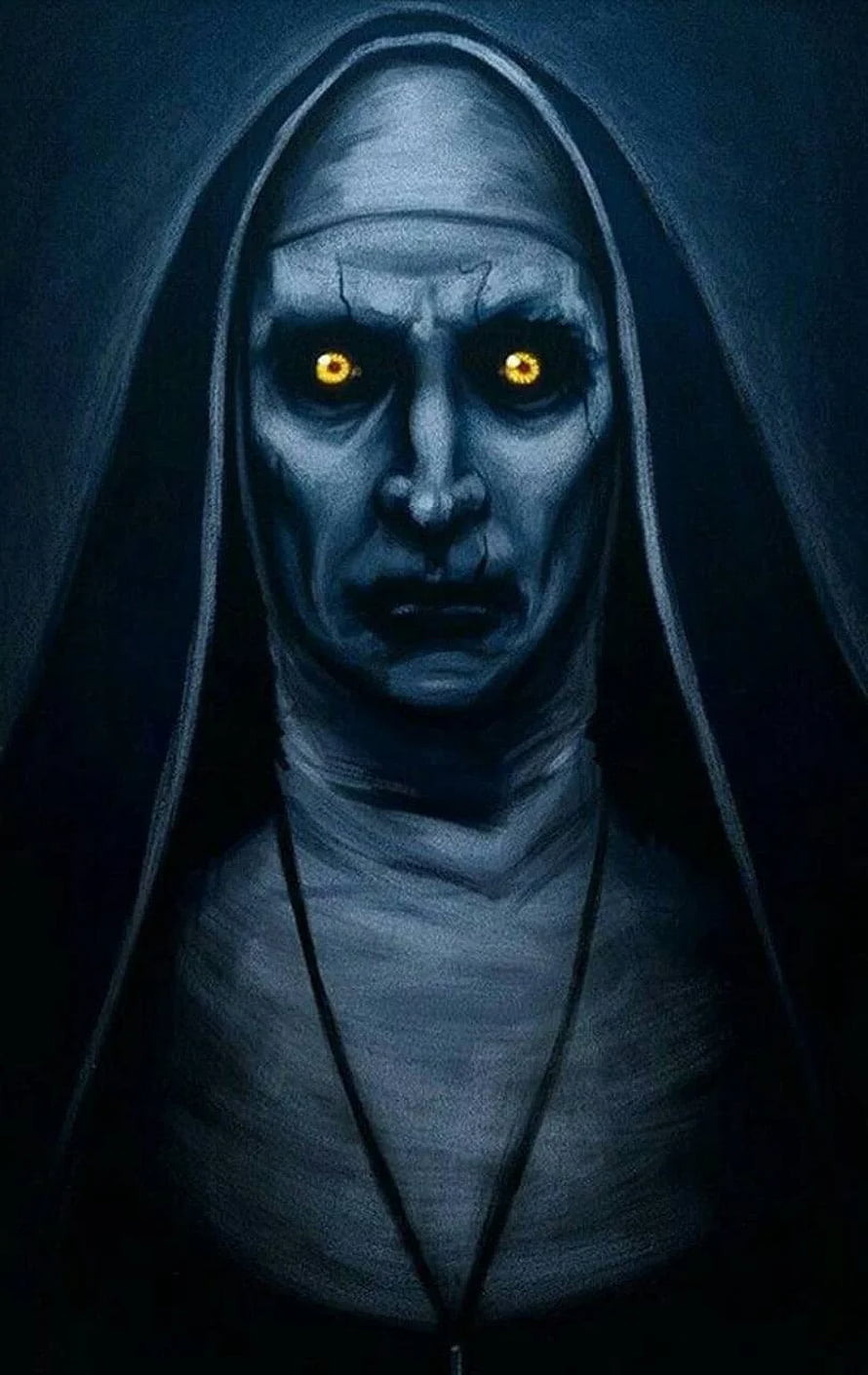 The Nun from The Conjuring Franchise with Glowing Yellow Eyes in Dark Hooded Portrait HD phone wallpaper