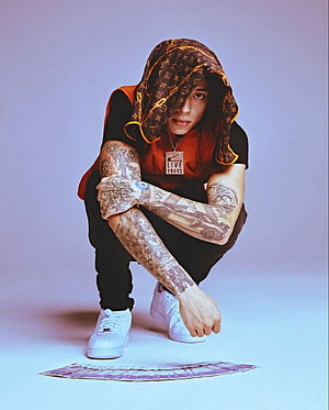 Central Cee Crouching Portrait With Louis Vuitton Scarf and Full Sleeve Tattoos HD phone wallpaper