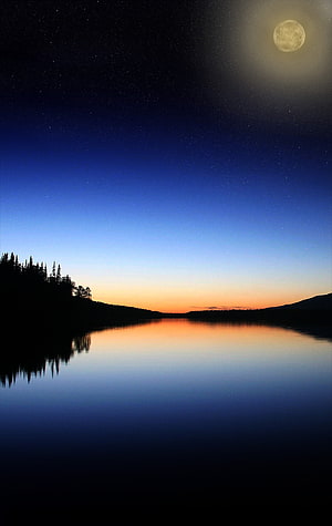 Full Moon Over a Serene Lake at Twilight with Starry Night Sky and Pine Tree Silhouettes HD phone wallpaper