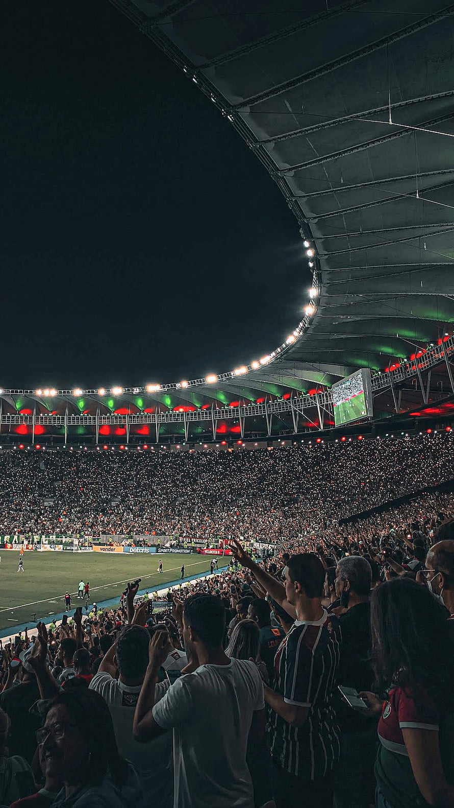 Fluminense Fans Celebrating at Maracana Stadium During a Night Football Match HD phone wallpaper
