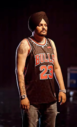 Sidhu Moose Wala wearing a black Chicago Bulls jersey and turban HD phone wallpaper