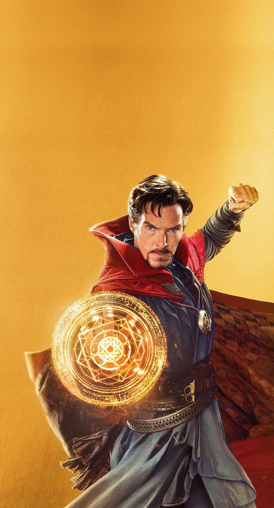 Doctor Strange Casting a Glowing Golden Magic Circle in a Dynamic Action Pose HD phone wallpaper