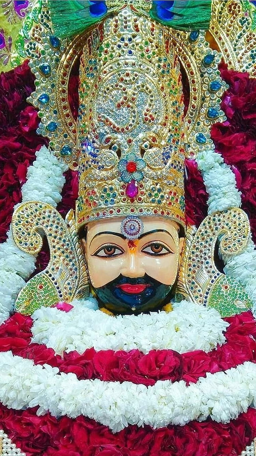 Lord Ayyappa Murali Dharan Idol With Golden Crown And Flower Garland HD phone wallpaper