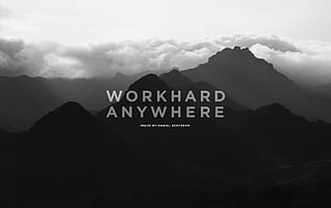 Monochrome Mountain Range with Dramatic Clouds and Motivational Typography HD wallpaper