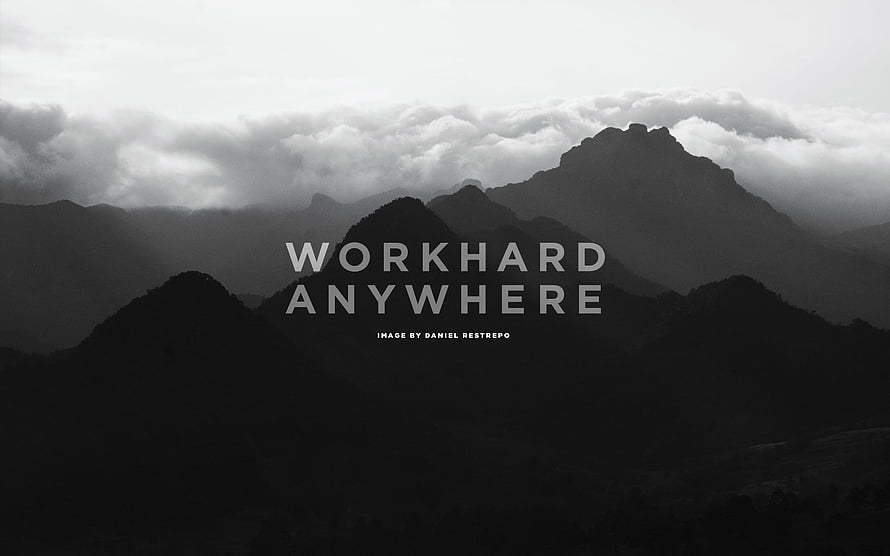 Monochrome Mountain Range with Dramatic Clouds and Motivational Typography HD wallpaper