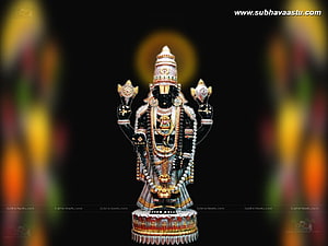 Ornate Black Stone Statue of Lord Ayyappa with Traditional Jewelry and Crown HD wallpaper