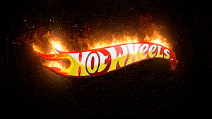 Hot Wheels Logo with Fiery Flames on Dark Textured Background HD wallpaper