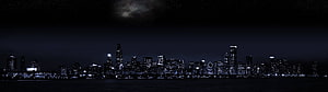 Chicago Skyline at Night with Moonlit Clouds Over Lake Michigan HD wallpaper