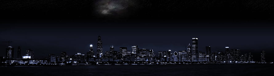 Chicago Skyline at Night with Moonlit Clouds Over Lake Michigan HD wallpaper