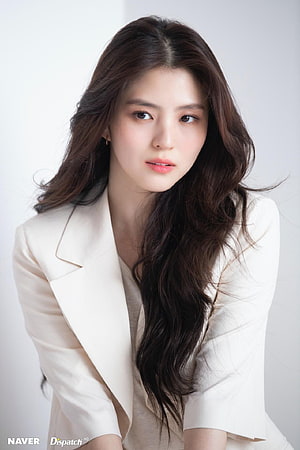 Minkyu from Blackpink in a stylish white blazer with long wavy hair HD phone wallpaper