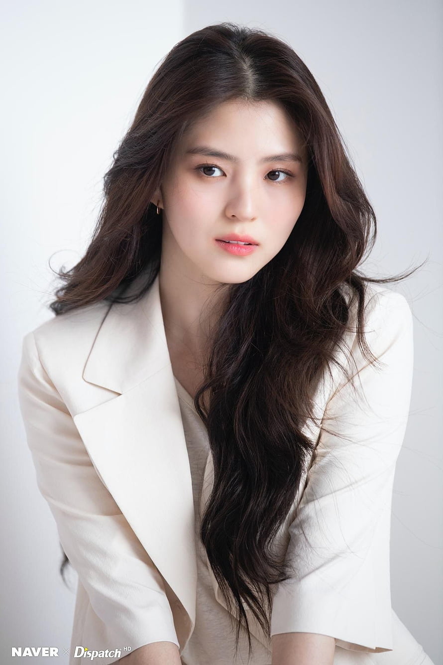Minkyu from Blackpink in a stylish white blazer with long wavy hair HD phone wallpaper
