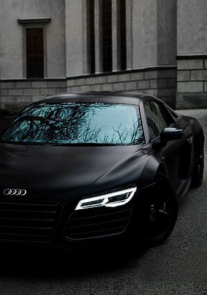 Matte Black Audi R8 Coupe Parked in Front of a Classic Stone Building HD phone wallpaper