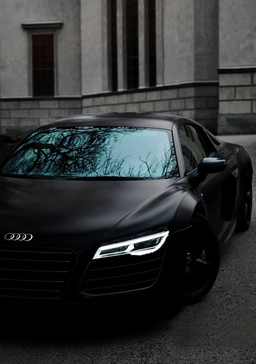 Matte Black Audi R8 Coupe Parked in Front of a Classic Stone Building HD phone wallpaper