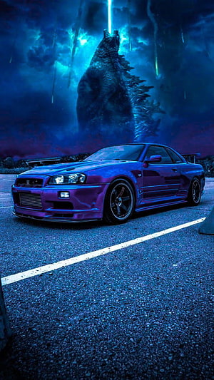 Nissan Skyline GT-R R34 with Godzilla in Dramatic Night Scene HD phone wallpaper