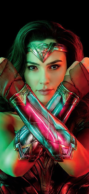 Gal Gadot as Wonder Woman in Dramatic Red and Green Lighting with Crossed Arms, Wonder Woman 1984 , Gal Gadot, DC Comics, 2020 Movies, Black background, Movies, Wonder Woman HD phone wallpaper