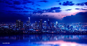 Los Angeles Skyline at Night with Blue and Purple Twilight Reflections on Water HD wallpaper