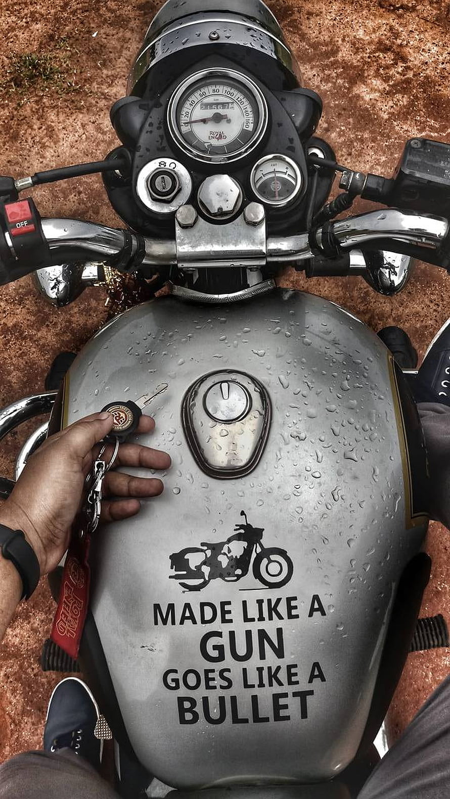 Royal Enfield Bullet Tank Close-Up With Rider Hand and Keychain HD phone wallpaper