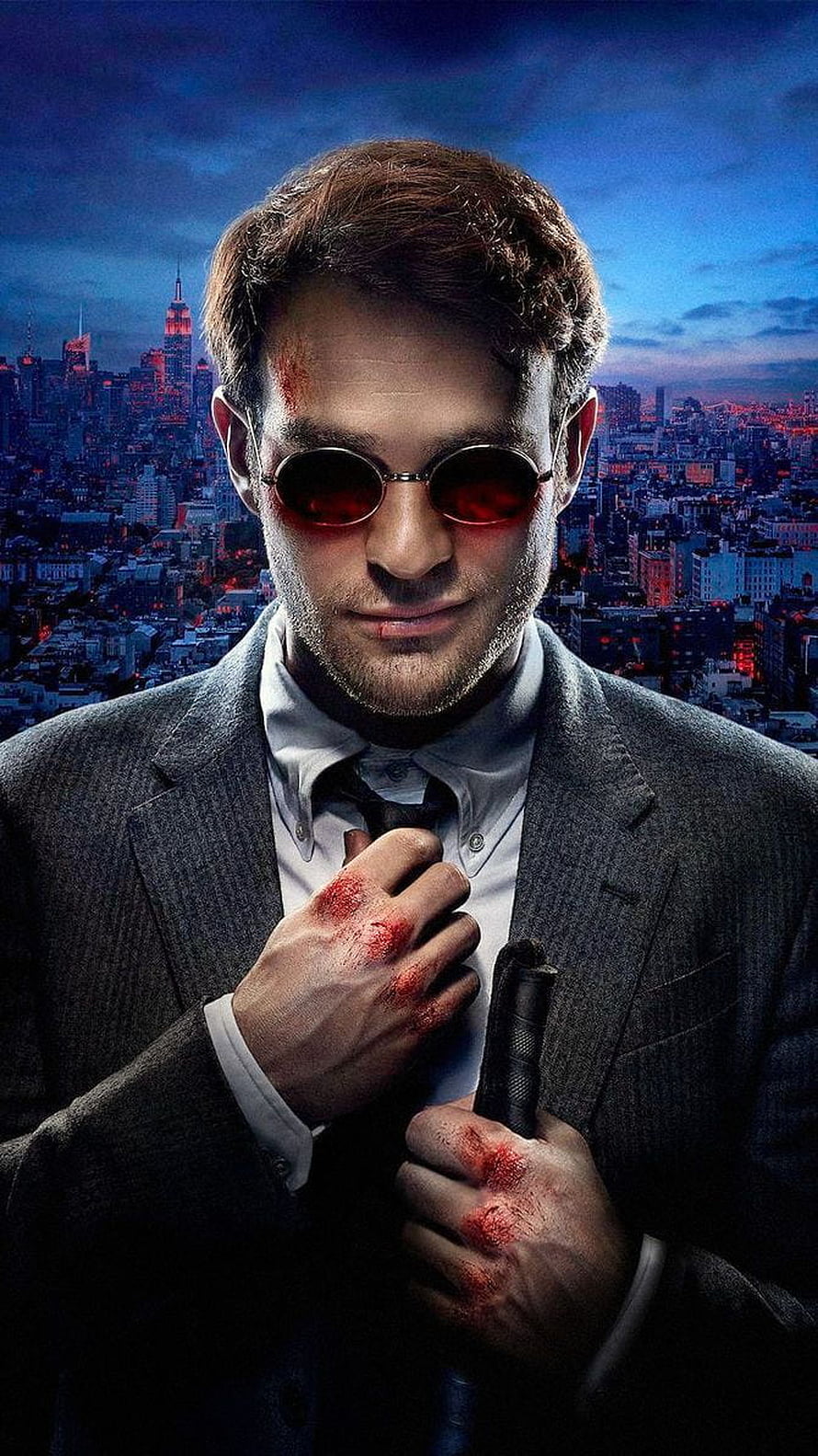 Daredevil Matt Murdock in Suit with Red Tinted Glasses and Bloodied Hands Against City Skyline HD phone wallpaper