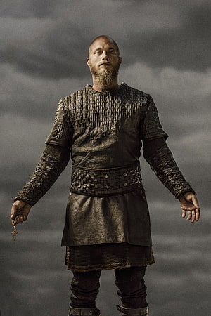 Ragnar Lothbrok from Vikings TV Series in Chainmail Armor Holding a Cross HD phone wallpaper