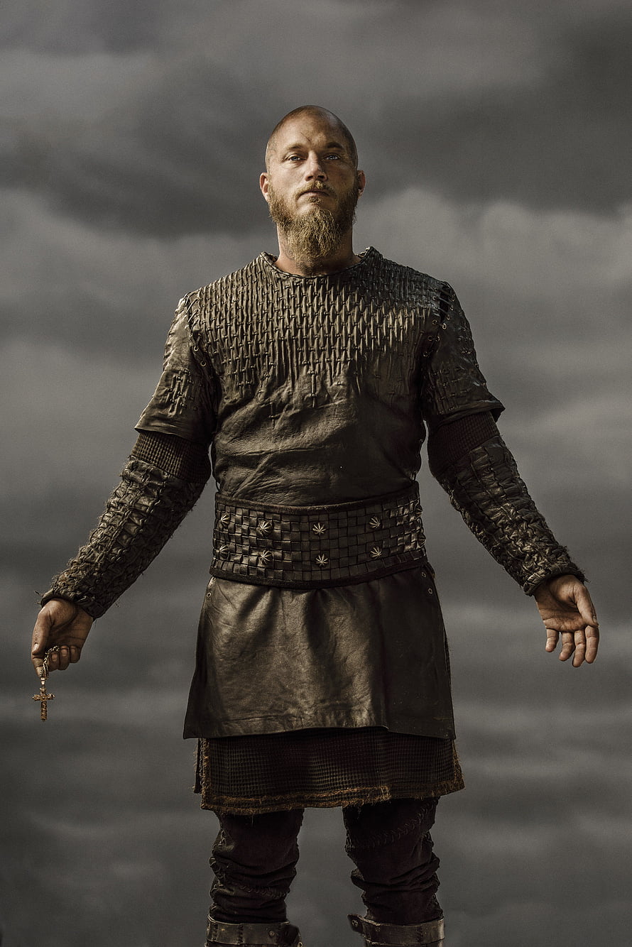 Ragnar Lothbrok from Vikings TV Series in Chainmail Armor Holding a Cross HD phone wallpaper