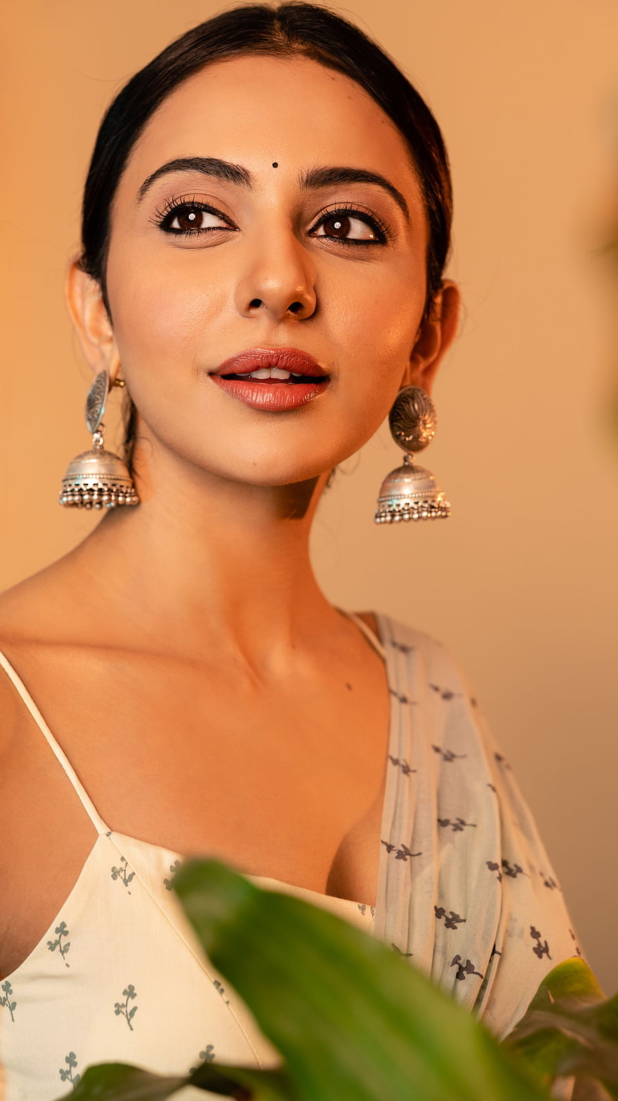 Rakul Preet Singh Portrait in Traditional Silver Jhumka Earrings and Floral Saree HD phone wallpaper