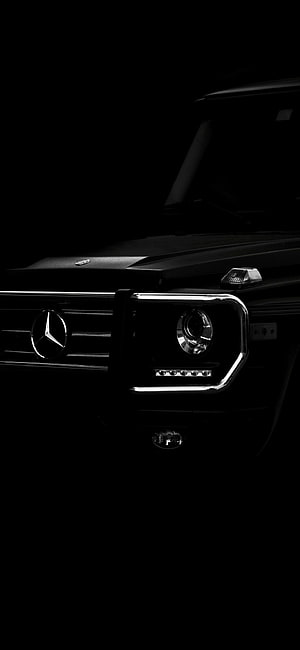 Mercedes-Benz G-Class Front Grille and Headlight Detail in Dark Lighting HD phone wallpaper