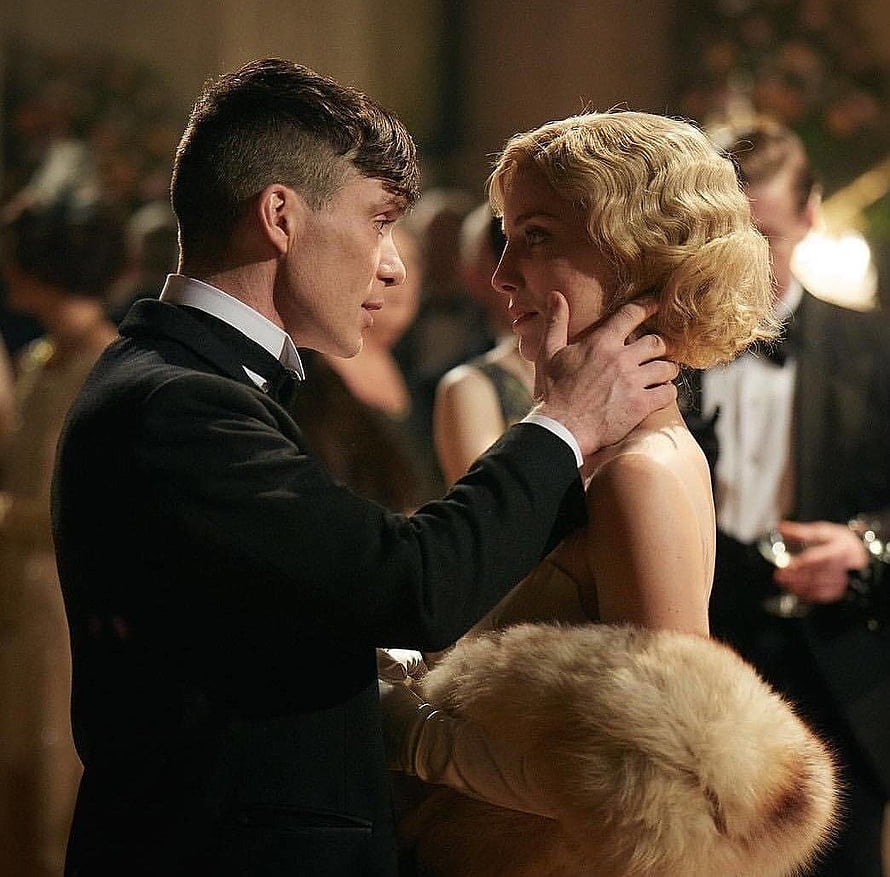 Peaky Blinders Tommy Shelby and Grace in an intimate moment at a formal gala event HD wallpaper