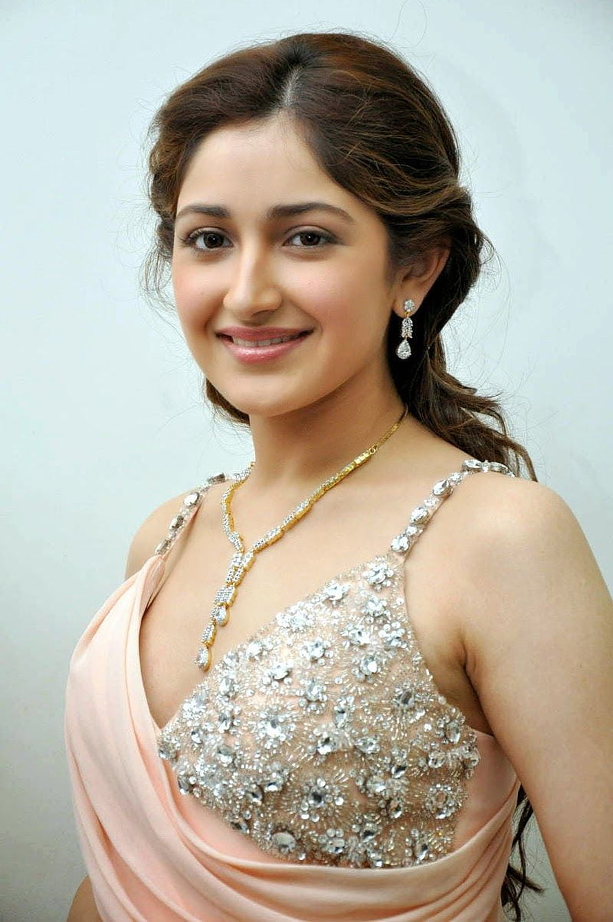 Tamannaah Bhatia in a glamorous peach gown with sparkling embellishments and elegant jewelry, Sayyeshaa Saigal Hot & . Actress bikini HD phone wallpaper