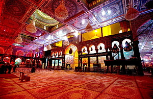 Imam Hussain Shrine Interior in Karbala with Ornate Ceilings and Chandeliers HD wallpaper