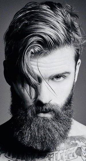 Black and white portrait of a bearded man with long swept hair and visible tattoos, beard #drag #moustache #whiskers #goatee #bearded #beardie #beardy #beardedmen #beardedman #bea. Beard , Mens hairstyles with beard, Beard hairstyle HD phone wallpaper