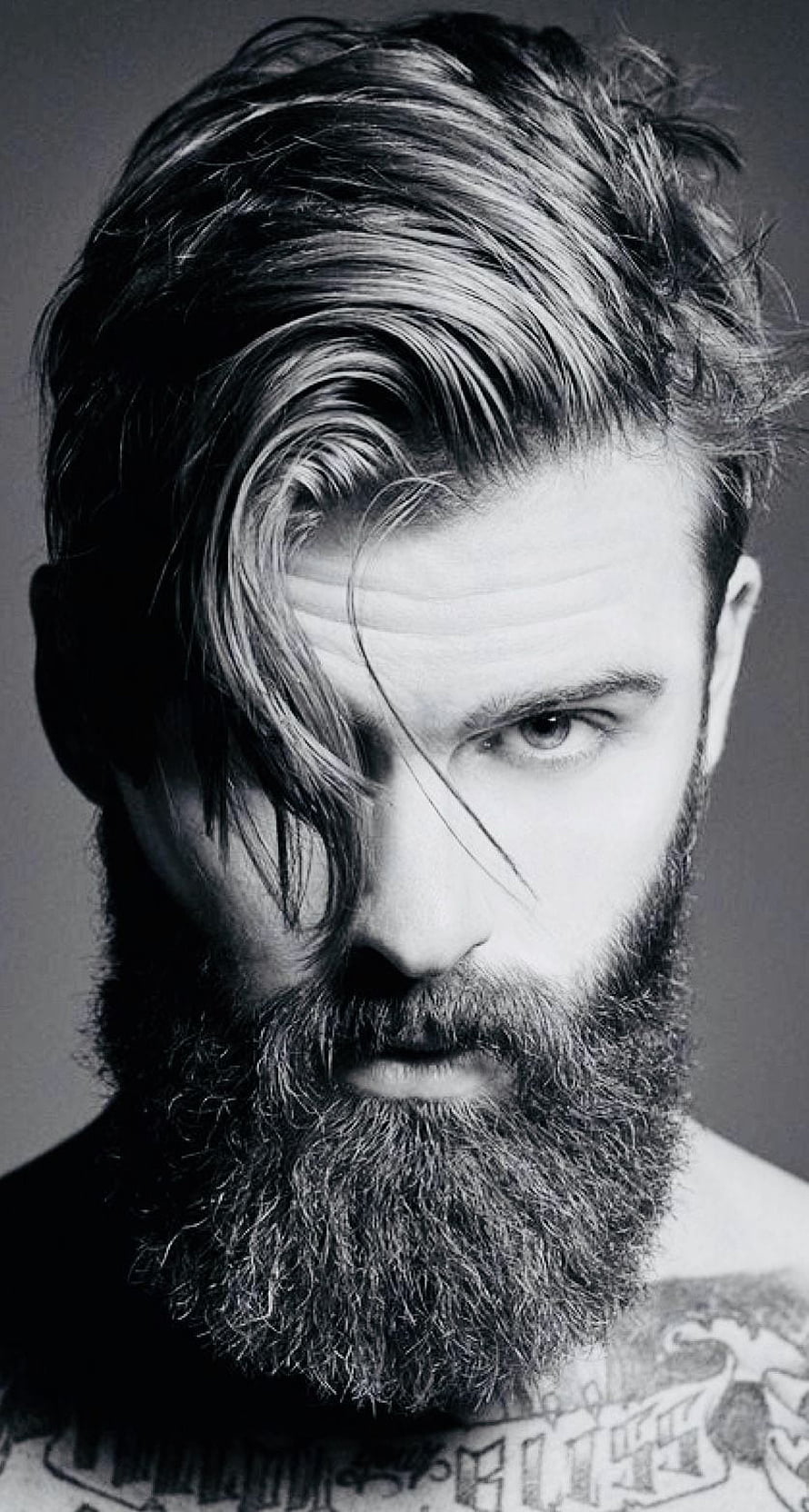 Black and white portrait of a bearded man with long swept hair and visible tattoos, beard #drag #moustache #whiskers #goatee #bearded #beardie #beardy #beardedmen #beardedman #bea. Beard , Mens hairstyles with beard, Beard hairstyle HD phone wallpaper
