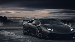 Matte Black Lamborghini Huracan LP610-4 on a Dark Overcast Day HD wallpaper