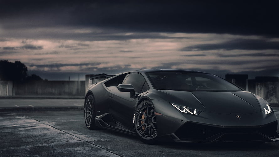 Matte Black Lamborghini Huracan LP610-4 on a Dark Overcast Day HD wallpaper