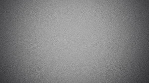 Dark Grey Grainy Texture Background With Subtle Vignette Effect HD wallpaper