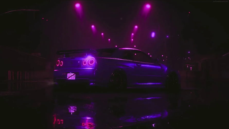 Nissan Skyline R34 GT-R in Neon Purple Night Scene with Wet Street Reflections HD wallpaper