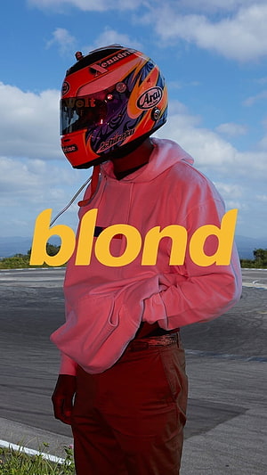 Frank Ocean Blond Aesthetic Portrait with Racing Helmet and Pink Hoodie HD phone wallpaper