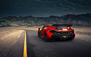 Red McLaren P1 Super Car Driving on Desert Highway at Dusk HD wallpaper