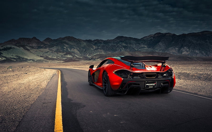 Red McLaren P1 Super Car Driving on Desert Highway at Dusk HD wallpaper