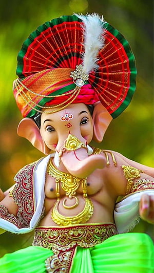 Cute Baby Ganesha Idol Wearing Ornate Turban and Gold Jewelry HD phone wallpaper