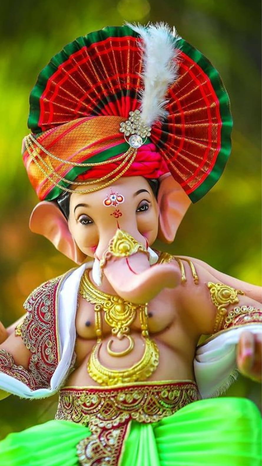 Cute Baby Ganesha Idol Wearing Ornate Turban and Gold Jewelry HD phone wallpaper