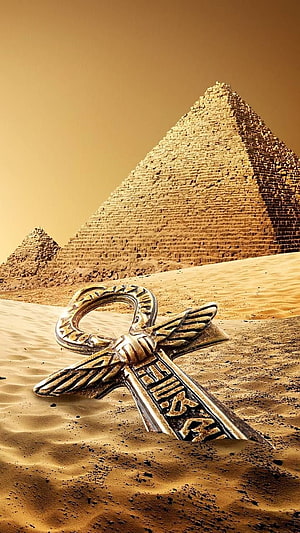 Golden Ankh Key Resting in Sand Before the Great Pyramids of Giza HD phone wallpaper
